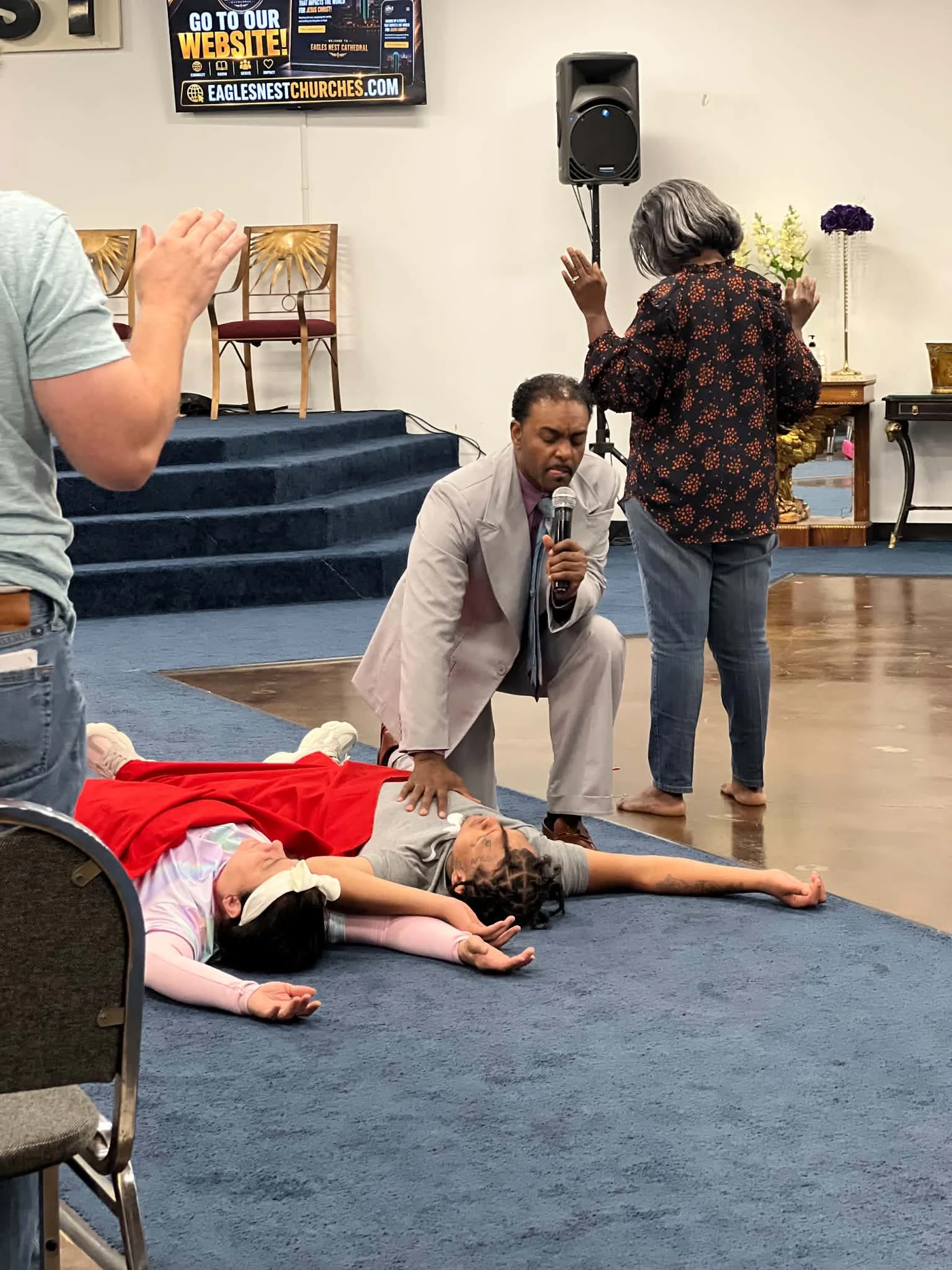 Prayer gathering during Dennis Dixon ministry